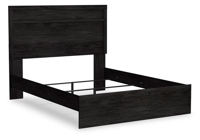 Ashley Furniture Belachime bed with a stylish wooden frame, shown from a side angle highlighting its elegant design.