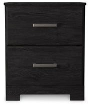 Ashley Furniture Belachime nightstand with a sleek wood finish and modern design, featuring a single drawer and open shelf.
