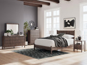 Ashley Furniture Pamytta Nightstand with a sleek wooden finish and modern design, featuring a drawer and open shelf.