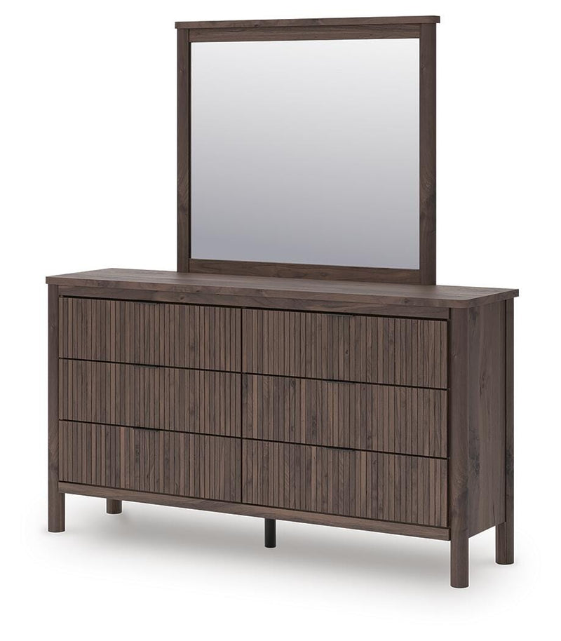 Ashley Furniture Pamytta dresser with matching mirror, showcasing a stylish wooden storage unit with a mirror attached.