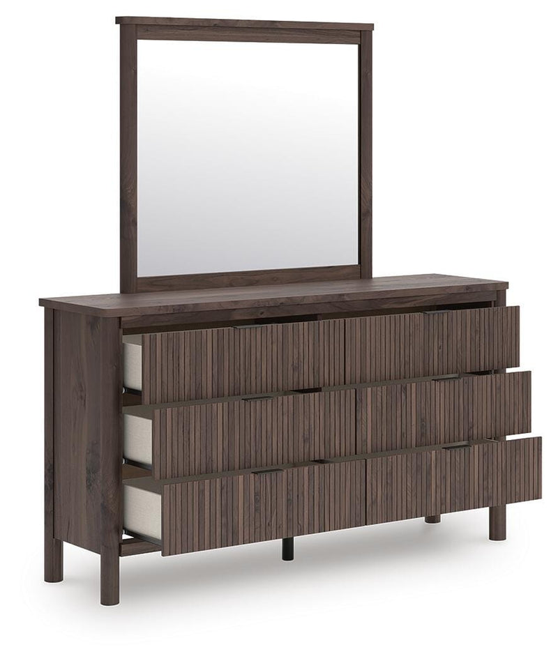 Ashley Furniture Pamytta dresser with an attached mirror, featuring a sleek wooden finish and modern design, shown from an angled perspective.
