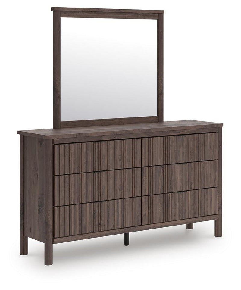 Ashley Furniture Pamytta dresser with mirror, wooden bedroom furniture set featuring multiple drawers and a large matching mirror.