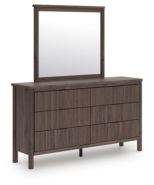 Ashley Furniture Pamytta dresser with mirror, wooden bedroom furniture set featuring multiple drawers and a large matching mirror.