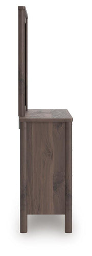 Ashley Furniture Pamytta dresser with matching mirror, featuring a modern wood finish and sleek design for bedroom storage.