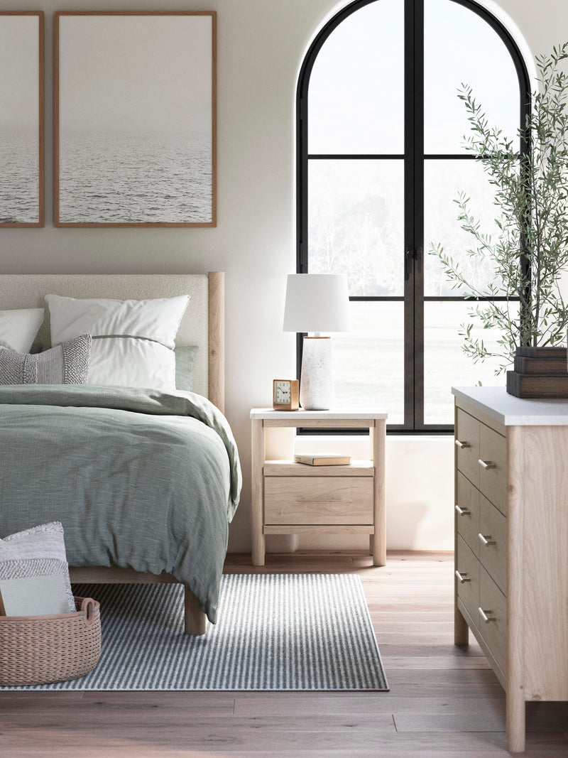 Ashley Furniture Cadmori nightstand with a dark wood finish, featuring a single drawer and open shelf for bedroom storage.