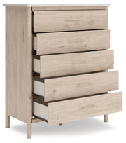 Open angle view of Ashley Furniture Cadmori Chest of Drawers showcasing its wooden finish and multiple drawers for storage.