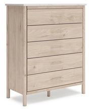 Ashley Furniture Cadmori chest of drawers with a sleek wood finish, angled view showcasing multiple drawers and modern design.