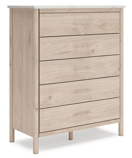 Ashley Furniture Cadmori chest of drawers with a sleek wood finish, angled view showcasing multiple drawers and modern design.