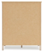Back view of the Ashley Furniture Cadmori chest of drawers showing dark wood finish and sleek drawer handles.