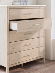 Ashley Furniture Cadmori chest of drawers with a sleek wooden finish and modern hardware, detailed close-up image.