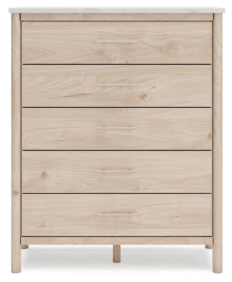 Ashley Furniture Cadmori chest of drawers with sleek wood finish and modern design, featuring multiple storage drawers.