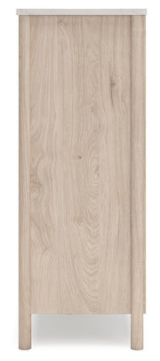Side view of the Cadmori chest of drawers by Ashley Furniture, showcasing its sleek wooden design and modern storage space.