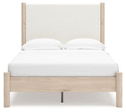 Ashley Furniture Cadmori upholstered bed with a padded headboard and elegant fabric finish, shown in a head-on view.