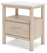 Ashley Furniture Cadmori nightstand with a dark wood finish, featuring a single drawer and open shelf for bedroom storage.