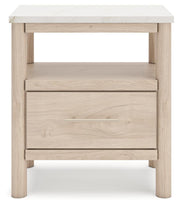Ashley Furniture Cadmori nightstand with a sleek wood finish and modern design, featuring a single drawer and open shelf.