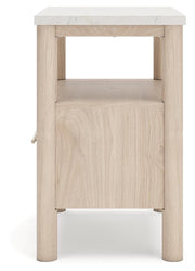 Ashley Furniture Cadmori nightstand with a modern wooden design featuring a single drawer and open shelf.