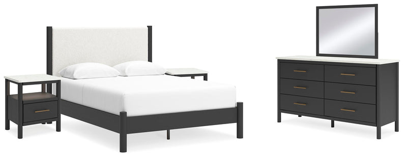 Ashley Furniture Cadmori bedroom set featuring a bed frame, nightstands, and dresser in a modern bedroom setting.