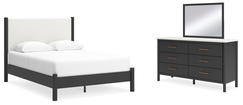 Ashley Furniture Cadmori bedroom set featuring a bed frame, matching nightstands, and dresser with a modern design.