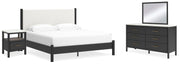 Ashley Furniture Cadmori bedroom set with bed frame, nightstand, and dresser in a modern bedroom decor.