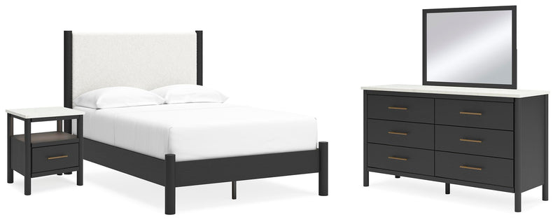 Ashley Furniture Cadmori bedroom set with a modern bed frame, matching nightstands, and dresser in a stylish bedroom setting.