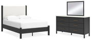 Ashley Furniture Cadmori bedroom set featuring a bed frame, matching nightstands, and dresser in a modern bedroom design.