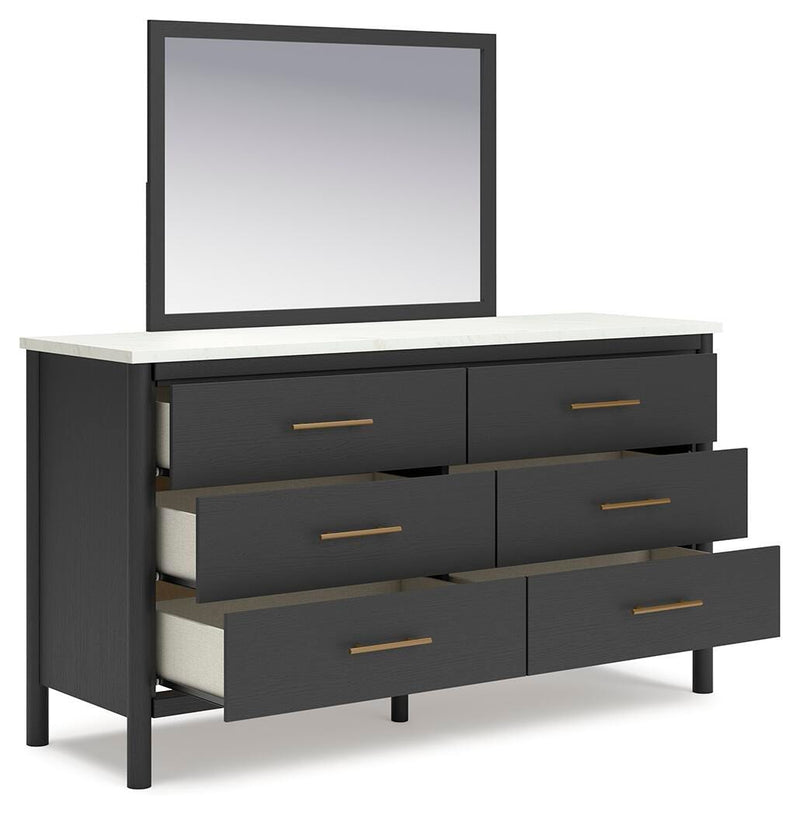 Ashley Furniture Cadmori bedroom set with bed frame, nightstands, and dresser, styled in a modern bedroom scene.