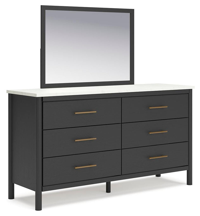 Ashley Furniture Cadmori bedroom set featuring a stylish bed, nightstands, and dresser in a modern bedroom design.