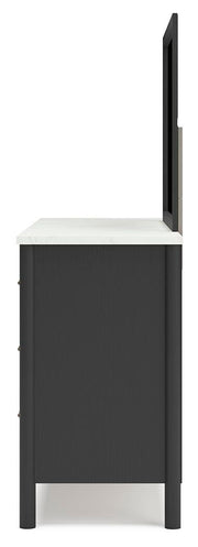 Ashley Furniture Cadmori bedroom set featuring a bed, nightstands, and dresser in a modern bedroom design.