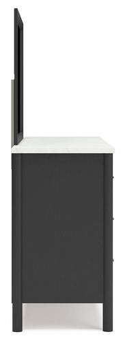 Ashley Furniture Cadmori bedroom set with a bed, nightstands, and dresser in a modern bedroom setup.