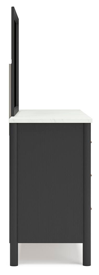 Ashley Furniture Cadmori bedroom set with a bed, nightstands, and dresser in a modern bedroom setup.