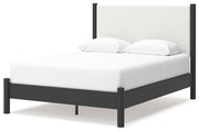 Ashley Furniture Cadmori bedroom set featuring a modern bed frame, nightstands, and matching dresser in a stylish bedroom setup.