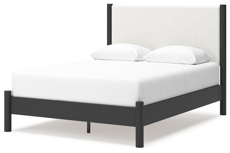 Ashley Furniture Cadmori bedroom set featuring a modern bed frame, nightstands, and matching dresser in a stylish bedroom setup.
