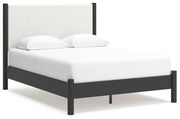 Ashley Furniture Cadmori bedroom set with a bed, nightstands, and dresser in a modern bedroom scene.