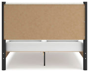 Ashley Furniture Cadmori bedroom set with a modern bed frame, matching nightstands, and a coordinated dresser in a stylish bedroom.
