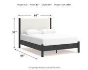 Ashley Furniture Cadmori bedroom set with a bed, nightstands, and dresser in a modern bedroom interior.