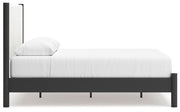Ashley Furniture Cadmori bedroom set with a modern bed, matching nightstands, and dresser in a stylish bedroom setting.