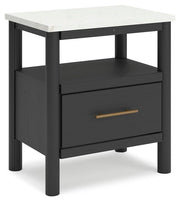 Ashley Furniture Cadmori bedroom set with a bed, nightstands, and dresser, shown from an angled side view in the image.