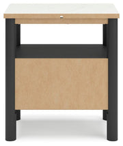Ashley Furniture Cadmori bedroom set featuring a modern bed frame, nightstands, and matching dresser in a stylish bedroom setting.