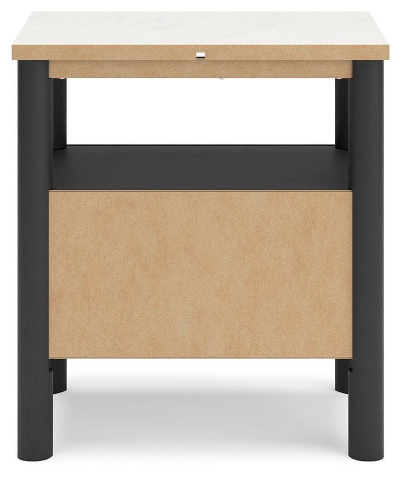 Ashley Furniture Cadmori bedroom set featuring a modern bed frame, nightstands, and matching dresser in a stylish bedroom setting.