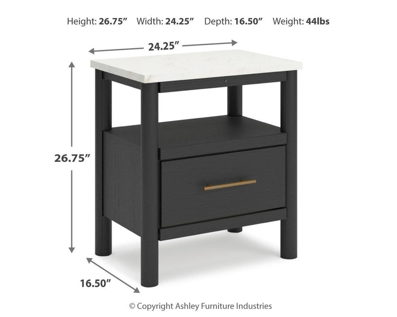 Ashley Furniture Cadmori bedroom set featuring a modern bed frame, matching nightstands, and a stylish dresser in a cozy bedroom.