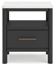 Ashley Furniture Cadmori bedroom set featuring a bed frame with a headboard and matching furniture pieces in a stylish bedroom setting.