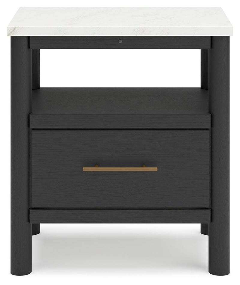 Ashley Furniture Cadmori bedroom set featuring a bed frame with a headboard and matching furniture pieces in a stylish bedroom setting.