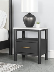 Ashley Furniture Cadmori bedroom set with bed frame, nightstands, and dresser in a stylish modern design.