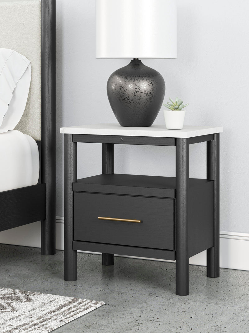 Ashley Furniture Cadmori bedroom set with bed frame, nightstands, and dresser in a stylish modern design.