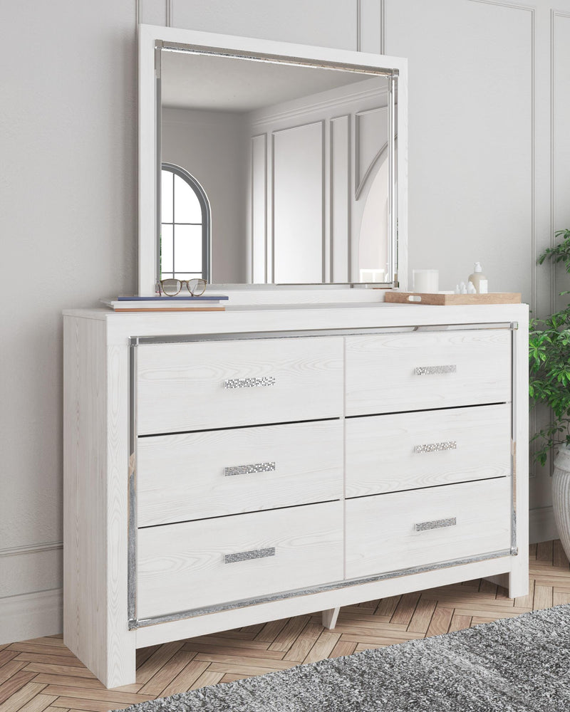 Ashley Furniture Altyra dresser with matching mirror, featuring a sleek wooden finish and modern design for bedroom storage.