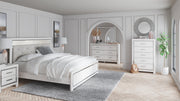 Ashley Furniture Altyra bedroom set with a modern bed frame, matching nightstands, and dresser in a stylish bedroom scene.