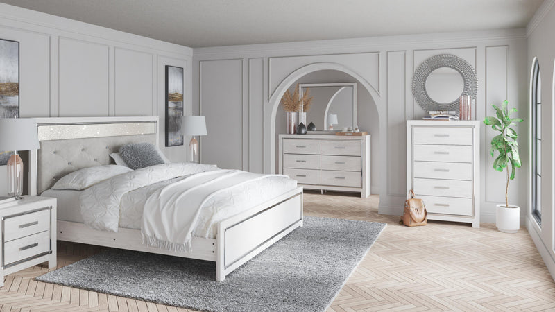 Ashley Furniture Altyra bedroom set with a modern bed frame, matching nightstands, and dresser in a stylish bedroom scene.