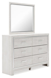 Ashley Furniture Altyra dresser with matching mirror, showcasing a modern wood finish and sleek design from a side angle.