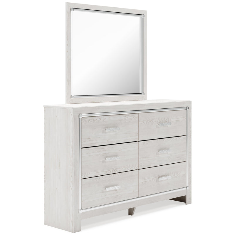 Ashley Furniture Altyra bedroom set with a bed, nightstands, and dresser in a modern design, shown from an angled view.