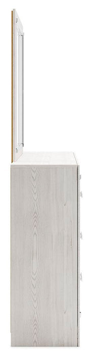 Altyra dresser and mirror by Ashley Furniture featuring a sleek wooden dresser with an attached matching mirror.
